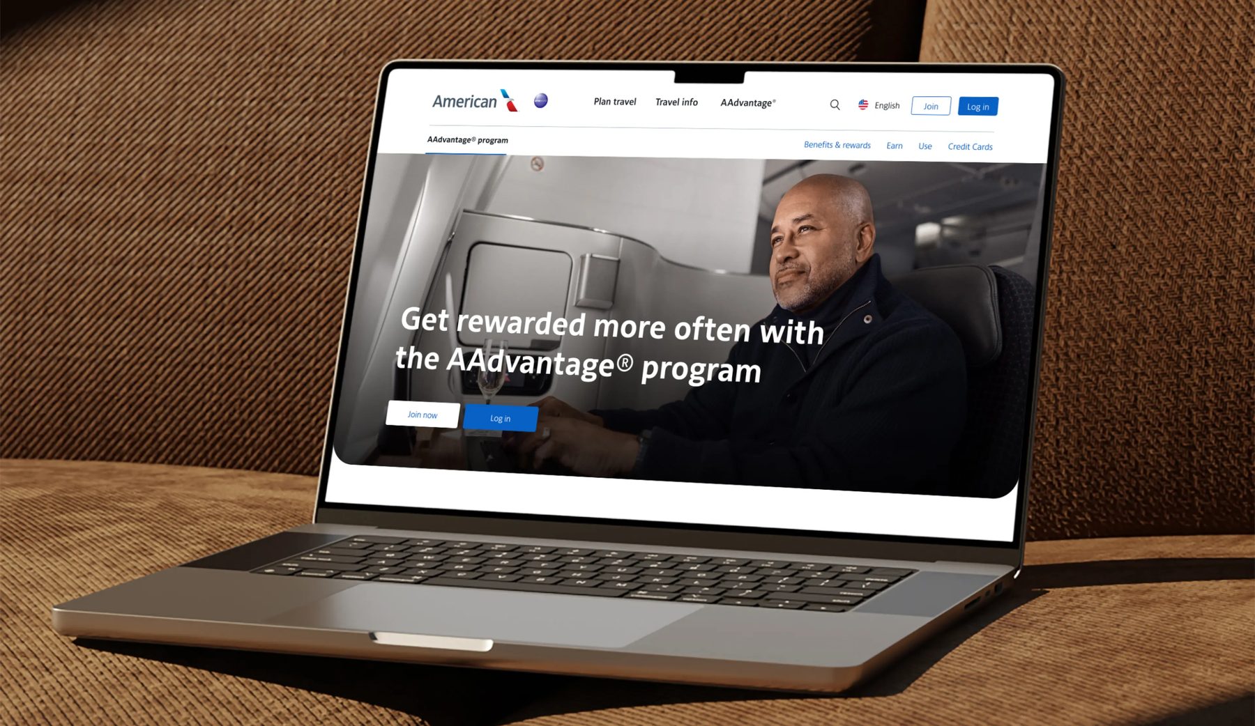 AAdvantage program page shown on a laptop with the headline Get rewarded more often